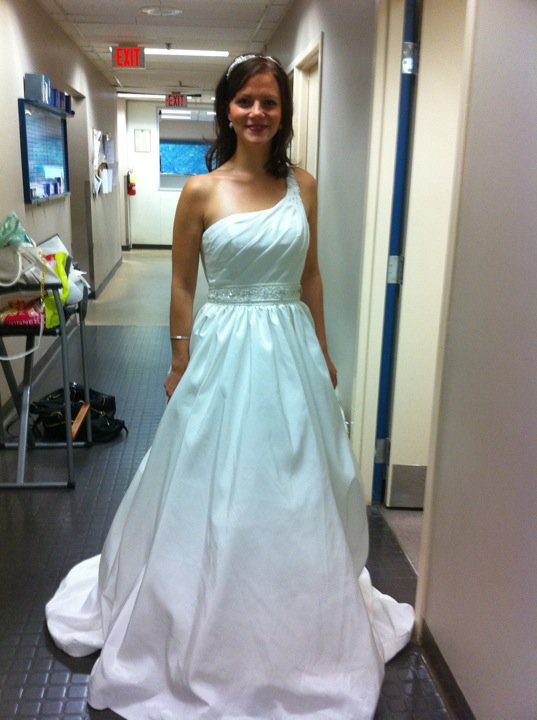 MoriLee Wedding Dress with pockets and an asymmetrical neckline